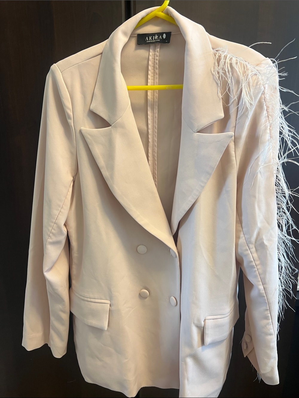 Akira soft pink double breast blazer with feathers down one side. XL